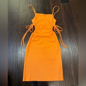 Zara orange mini dress. Cut outs on side with ties.